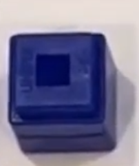 close up picture of a unifix cube