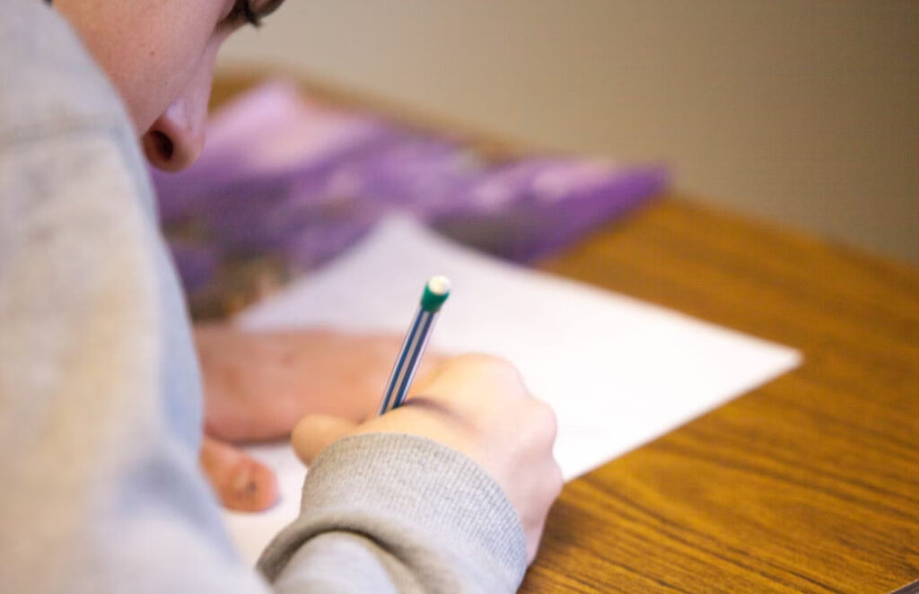 picture of student taking test for reference